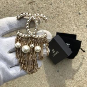 Chanel Gold and Pearl brooch